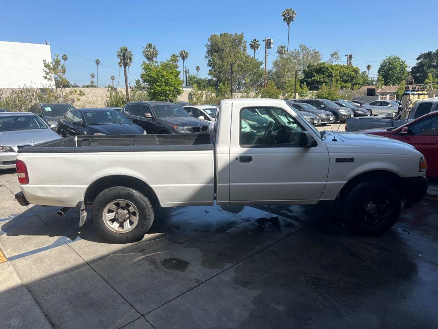 2011 WHITE /GRAY Ford Ranger XL 2WD (1FTKR1AE9BP) with an 4.0L V6 SOHC 12V engine, AUTOMATIC transmission, located at 30 S. Berkeley Avenue, Pasadena, CA, 91107, (626) 248-7567, 34.145447, -118.109398 - Body Style 2-Door REGULAR CAB PICKUP 2-DR Trim XL 2WD Engine 4.0L V6 SOHC 12V Other Transmission AUTOMATIC Drivetrain RWD Ext. Color WHITE Int. Color GRAY Stock Number 7662 VIN 1FTKR1AE9BPA78334 Location Crown City Motors Pasadena, CA WORK TRUCK!!! Crown City Motors is a use - Photo#5